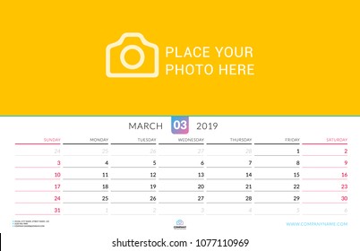 Wall calendar for March 2019. Vector design print template with place for photo. Week starts on Sunday. Landscape orientation