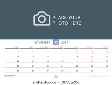 Wall calendar for November 2019. Vector design print template with place for photo. Week starts on Monday. Landscape orientation