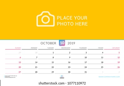Wall calendar for October 2019. Vector design print template with place for photo. Week starts on Sunday. Landscape orientation