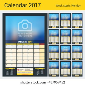 Wall Calendar Planner for 2017 Year. Vector Design Print Template with Place for Photo. Dark Background. Week Starts Monday. 