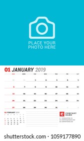 Wall calendar planner for 2019 year. January. Vector print template with place for photo. Week starts on Sunday