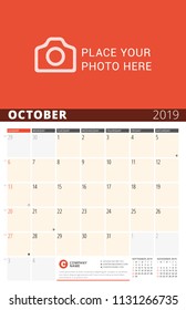 Wall Calendar Planner for 2019 Year. Vector Design Print Template with Place for Photo and Notes. Phases of the Moon. Week Starts on Sunday. 3 Months on Page. October 2019
