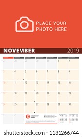 Wall Calendar Planner for 2019 Year. Vector Design Print Template with Place for Photo and Notes. Phases of the Moon. Week Starts on Sunday. 3 Months on Page. November 2019