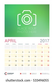 Wall Calendar Planner Template for 2017 Year. April. Vector Design Template with Place for Photo. Week starts Monday. Portrait Orientation