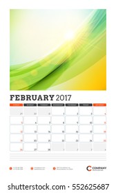 Wall Calendar Planner Template for 2017 Year. February. Vector Design Template with Abstract Background. Week starts Sunday. Portrait Orientation