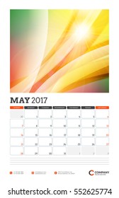 Wall Calendar Planner Template for 2017 Year. May. Vector Design Template with Abstract Background. Week starts Sunday. Portrait Orientation