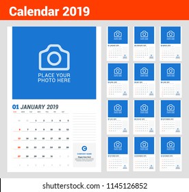 Wall calendar planner template for 2019 year. Vector design print template with place for photo. Week starts on Sunday