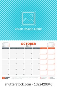 Wall calendar planner template for 2019 year. October 2019. Week starts on Monday. Vector illustration