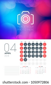 Wall calendar planner template for April 2018. Vector design print template with abstract background or place for photo. Week starts on Sunday