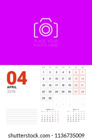 Wall calendar planner template for April 2019. Week starts on Monday. Vector illustration