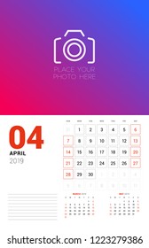 Wall calendar planner template for April 2019. Week starts on Sunday. Vector illustration