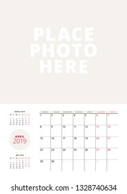 Wall calendar planner template for April 2019. Week starts on Monday. Vector illustration. Stationery print design