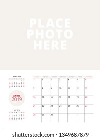 Wall calendar planner template for April 2019. Week starts on Sunday. Vector illustration. Stationery print design