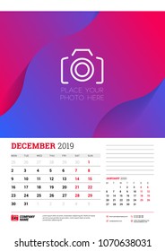 Wall calendar planner template for December 2019. Week starts on Monday. Vector illustration
