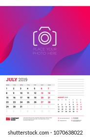 Wall calendar planner template for July 2019. Week starts on Monday. Vector illustration