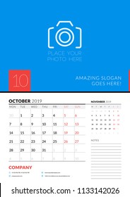 Wall calendar planner template for October 2019. Week starts on Monday. Vector illustration