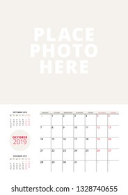 Wall calendar planner template for October 2019. Week starts on Monday. Vector illustration. Stationery print design