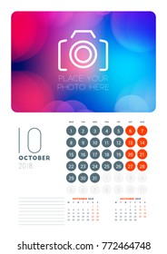 Wall calendar planner template for October 2018. Vector design print template with abstract background or place for photo. Week starts on Monday