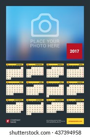 Wall Calendar Poster for 2017 Year. Vector Design Print Template with Place for Photo. Dark Background. Week Starts Monday. 12 Months. Stationery Design