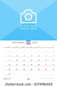 Wall calendar for September 2019. Vector design print template with place for photo. Week starts on Monday. Portrait orientation