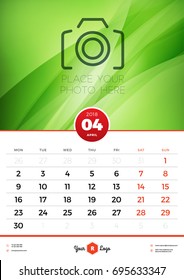 Wall Calendar Template for 2018 Year. April. Vector Design Template with Abstract Background. Place for Photo. Week starts on Monday. Portrait Orientation
