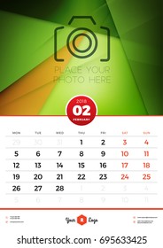 Wall Calendar Template for 2018 Year. February. Vector Design Template with Abstract Background. Place for Photo. Week starts on Monday. Portrait Orientation