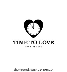 The wall clock illustration at 11.00 pm on the sign of the heart, the time for making love logo design