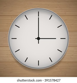 Wall  clock in the style of minimalism on wooden background