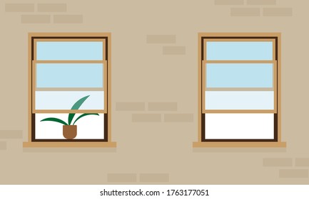 Die Wand des Hauses mit zwei Fenstern