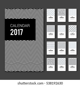 Wall Monthly Calendar concept. Vector Design Print Template of 12 Months with abstract geometric corporate identity patterns and illustrations. Week Starts Sunday 2017.