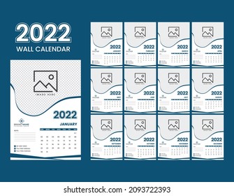 Wall Monthly Photo Calendar 2022. Simple monthly vertical photo calendar Layout for 2022 year in English. Cover Calendar, 12 months templates. Week starts from Sunday. Vector illustration
