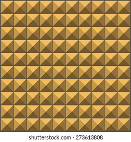 wall with yellow brown pyramid tiles pattern