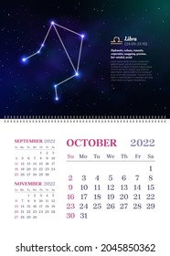 Wall zodiac calendar of October in vertical format. 2022 scheduler, planner, stationery organizer, week starts Sunday. Libra constellation astrological symbol on dark blue starry background