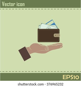 Wallet in hand. icon. Vector Eps 10