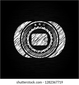 wallet icon inside chalk emblem written on a blackboard