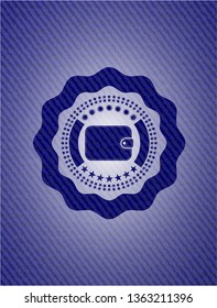 wallet icon inside emblem with jean background