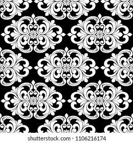 Wallpaper in Baroque style, damask. A seamless vector background. Black and white texture Floral ornament.