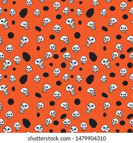 Wallpaper pattern for Halloween with skulls and dots.