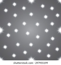Wallpaper seamless from glittering stars. Vector illustration. Eps 10