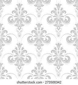 Wallpaper in the style of Baroque, damask. A seamless vector background. Gray and white ornament.