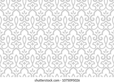 Wallpaper in the style of Baroque. A seamless vector background. White and grey floral ornament. Graphic pattern for fabric, wallpaper, packaging. Ornate Damask flower ornament.