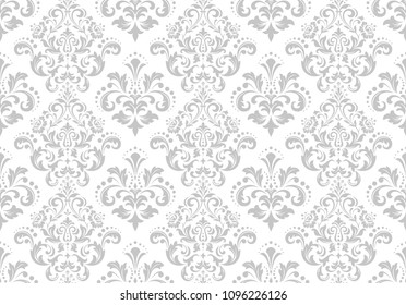 Wallpaper in the style of Baroque. A seamless vector background. White and grey floral ornament. Graphic pattern for fabric, wallpaper, packaging. Ornate Damask flower ornament.