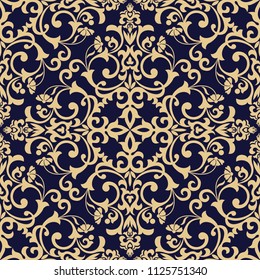 Wallpaper in the style of Baroque. Seamless vector background. Dark blue and gold floral ornament. Graphic pattern for fabric, wallpaper, packaging. Ornate Damask flower ornament