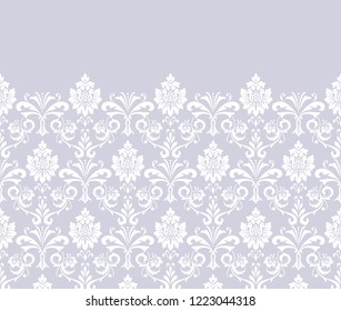 Wallpaper in the style of Baroque. Seamless vector background. White and grey floral ornament. Graphic pattern for fabric, wallpaper, packaging. Ornate Damask flower ornament.