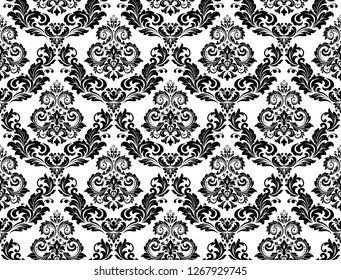 Wallpaper in the style of Baroque. Seamless vector background. White and black floral ornament. Graphic pattern for fabric, wallpaper, packaging. Ornate Damask flower ornament