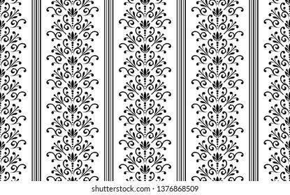 Wallpaper in the style of Baroque. Seamless vector background. White and black floral ornament. Graphic pattern for fabric, wallpaper, packaging. Ornate Damask flower ornament