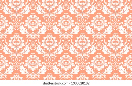 Wallpaper in the style of Baroque. Seamless vector background. White and pink floral ornament. Graphic pattern for fabric, wallpaper, packaging. Ornate Damask flower ornament