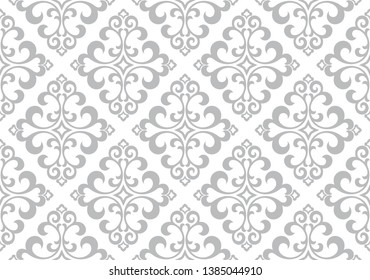 Wallpaper in the style of Baroque. Seamless vector background. White and grey floral ornament. Graphic pattern for fabric, wallpaper, packaging. Ornate Damask flower ornament.