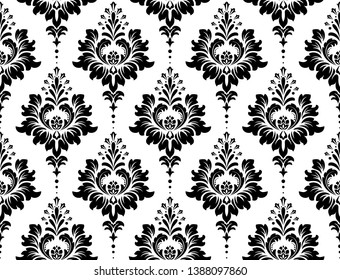 Wallpaper in the style of Baroque. Seamless vector background. White and black floral ornament. Graphic pattern for fabric, wallpaper, packaging. Ornate Damask flower ornament