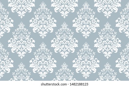 Wallpaper in the style of Baroque. Seamless vector background. White and blue floral ornament. Graphic pattern for fabric, wallpaper, packaging. Ornate Damask flower ornament